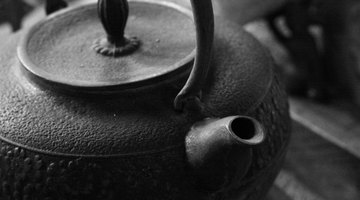 Heat water in a kettle or a pot
