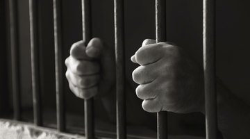 Use cardboard to make fake prison bars that look like real ones.