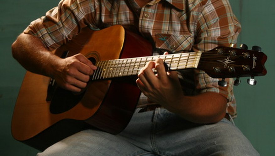 A hurdy gurdy is an early version of an acoustic guitar, but with a wheel and a keyboard.